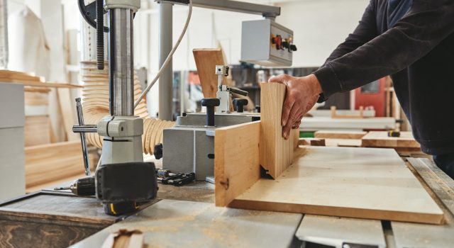 Artisans in Manufacturing. Cropped shot of craftsman working at his workstation